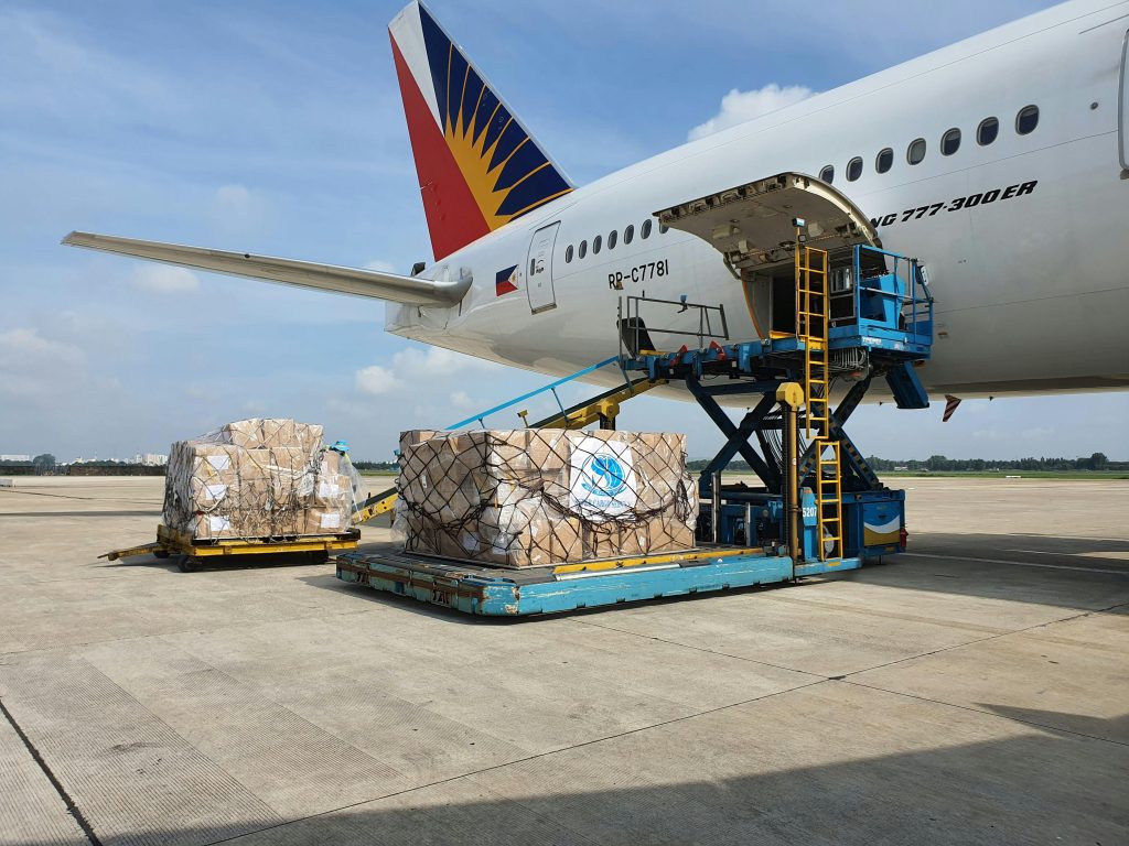 pexels-photo-9749472-9749472 Cargo being loaded onto a commercial airplane at an airport in Ho Chi Minh City, Vietnam.